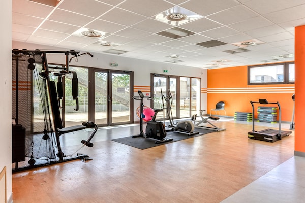 Foto van Appartement met uitzicht op het zwembad bij de Franse jachthaven - gym