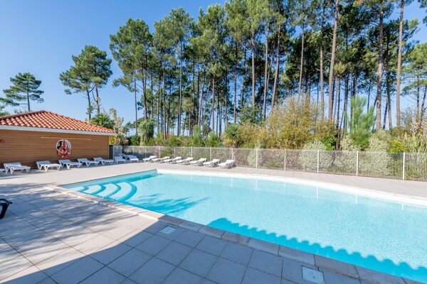 Foto van Bosverblijf voor 4 personen aan het meer - Vakantiehuis in Parentis-en-Born - PoolOfHouse