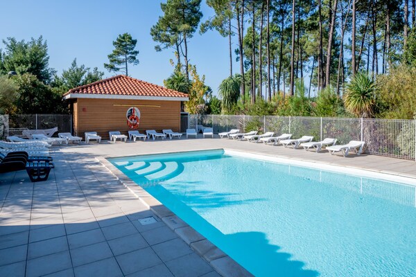 Foto van Bosverblijf voor 4 personen aan het meer - Vakantiehuis in Parentis-en-Born - PoolOfHouse