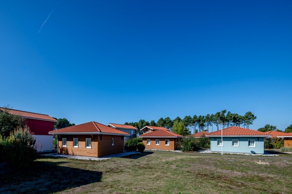 Foto van Bosverblijf voor 4 personen aan het meer - Vakantiehuis in Parentis-en-Born - ExteriorSummer