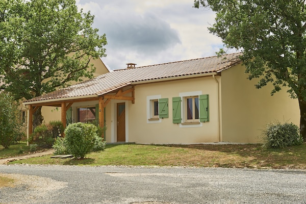 Foto van Bungalow in Lanzac bij Dordogne - Vakantiehuis in Lanzac - ExteriorSummer