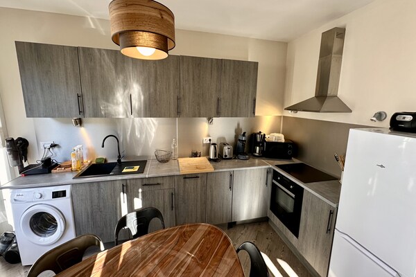 Foto van Rustig appartement in Mont-Dore - Vakantiehuis in Mont-Dore - Kitchen