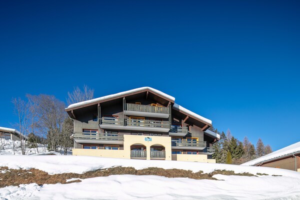 Foto van Appartement met 1 slaapkamer voor 6 personen in Doucy - ExteriorWinter