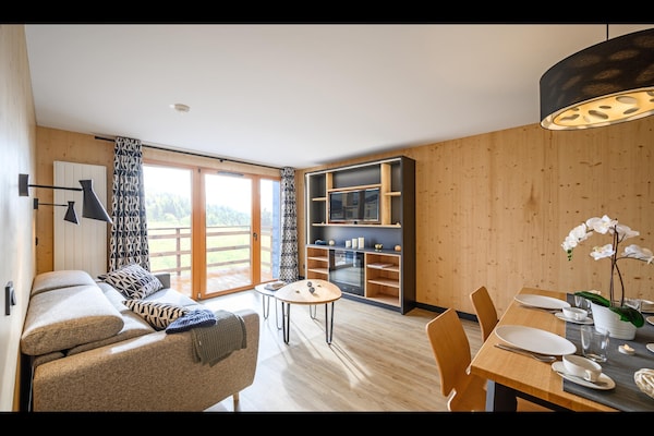 Foto van Appartement in Le Corbier met verwarmd zwembad - Vakantiehuis in Villarembert - LivingRoom