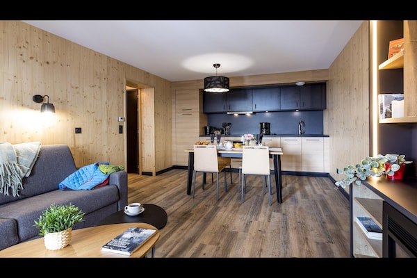 Foto van Appartement in Le Corbier met verwarmd zwembad - Vakantiehuis in Villarembert - LivingRoom