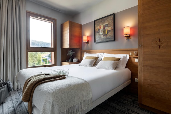 Foto van Berguitzicht vakantiehuis met balkon voor 8 - Vakantiehuis in Flaine - BedRoom