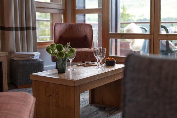 Foto van Berguitzicht vakantiehuis met balkon voor 8 - Vakantiehuis in Flaine - LivingRoom