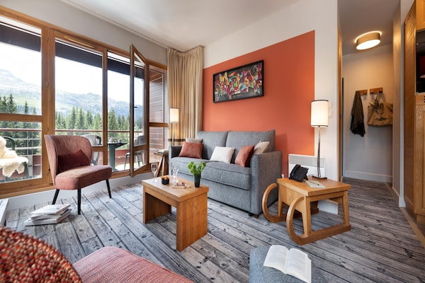 Foto van Berguitzicht vakantiehuis met balkon voor 8 - Vakantiehuis in Flaine - LivingRoom