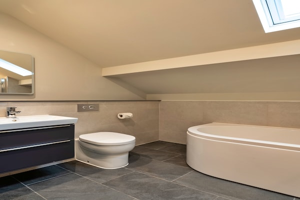 Foto van Cottage in Engelse Bos met Privétuin - Vakantiehuis in Dorsington - BathRoom