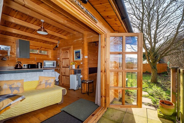 Foto van Huisdiervriendelijk chalet in Surlingham, Geen storting - LivingRoom