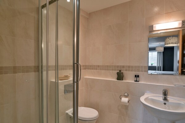 Foto van Appartement in Watergate Bay met zeezicht - Vakantiehuis in Watergate Bay - BathRoom