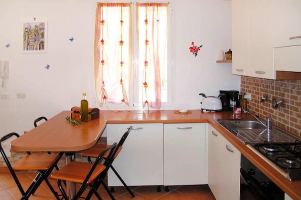 Foto van Appartement in Imperia met gemeenschappelijk zwembad - Kitchen
