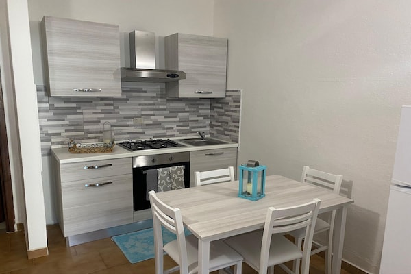 Foto van Appartement in Porto Pollo bij Surfparadijs - Vakantiehuis in Porto Pollo - Palau - Kitchen
