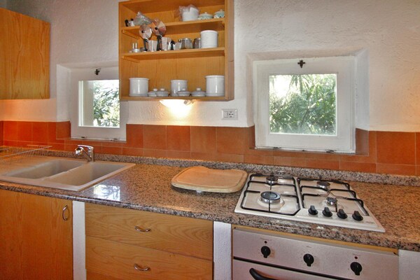 Foto van Vakantiehuis Costa Paradiso met Uitzicht - Vakantiehuis in Trinità d'Agultu e Vignola (OT) - Kitchen