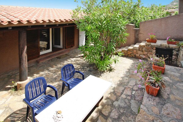 Foto van Vakantiehuis Costa Paradiso met Uitzicht - Vakantiehuis in Trinità d'Agultu e Vignola (OT) - GardenSummer