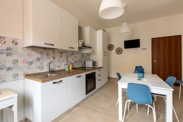 Foto van Appartamento con aria condizionata - Vakantiehuis in Sassari - DiningRoom