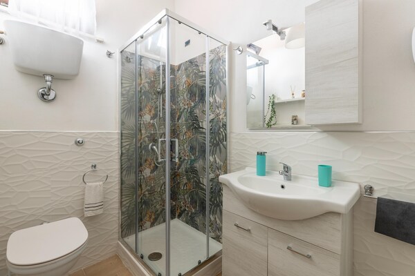 Foto van Appartamento con aria condizionata - Vakantiehuis in Sassari - BathRoom