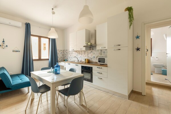 Foto van Appartamento con aria condizionata - Vakantiehuis in Sassari - LivingRoom