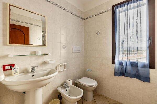 Foto van Een merrie van 150 meter, 2 aria condizionata - Vakantiehuis in Valledoria - BathRoom