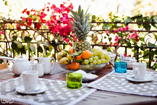 Foto van Appartement met gedeeld zwembad in Pula - Vakantiehuis in Pula (CA) - TerraceBalcony