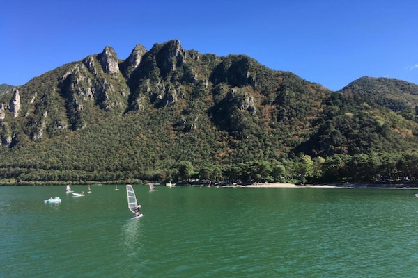 Foto van Cottage in Parole bij bos en meer - Vakantiehuis in Idro - AreaSummer20KM