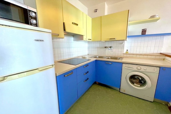 Foto van Prachtig strandappartement in Caorle - Vakantiehuis in Porto Santa Margherita - Caorle - Kitchen
