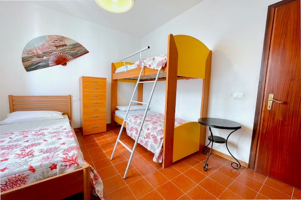 Foto van Appartement in Caorle bij Spiaggia Tartaruga - Vakantiehuis in Porto Santa Margherita (VE) - BedRoom