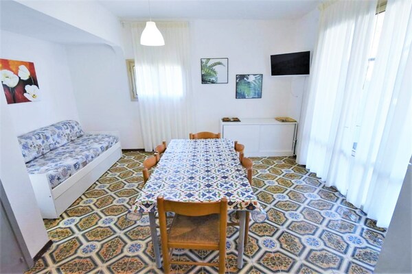 Foto van Villa in Caorle bij Spiaggia Tartaruga - Vakantiehuis in Porto Santa Margherita (VE) - LivingRoom