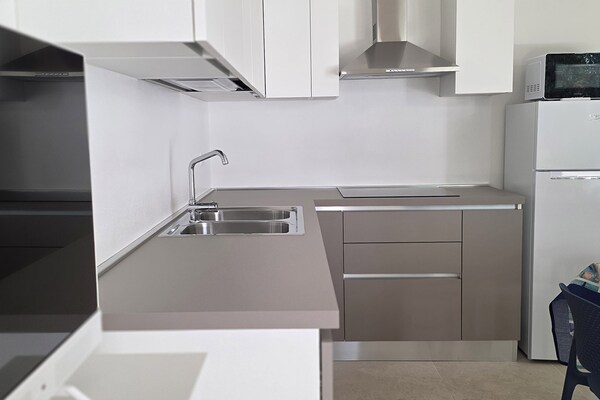 Foto van Appartement in Rosolina Mare (RO) - Vakantiehuis in Rosolina Mare (RO) - Kitchen