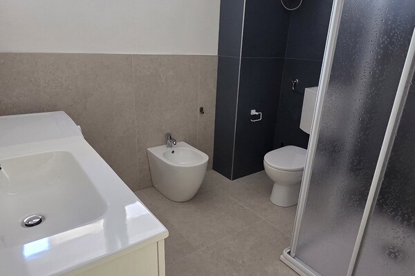 Foto van Appartement in Rosolina Mare (RO) - Vakantiehuis in Rosolina Mare (RO) - BathRoom