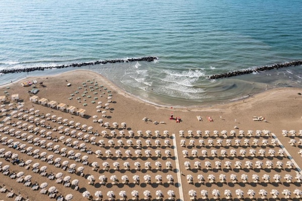 Foto van Lodge in het familiedorp Rimini vlakbij het strand - AreaSummer5KM