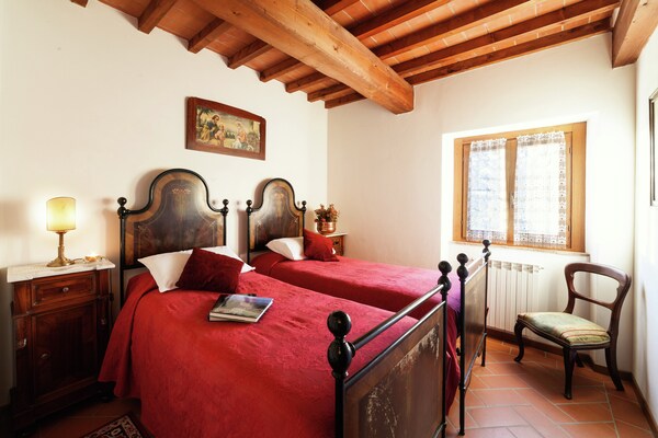 Foto van Boerderij in Poppi met zwembad en natuur - Vakantiehuis in Poppi - BedRoom