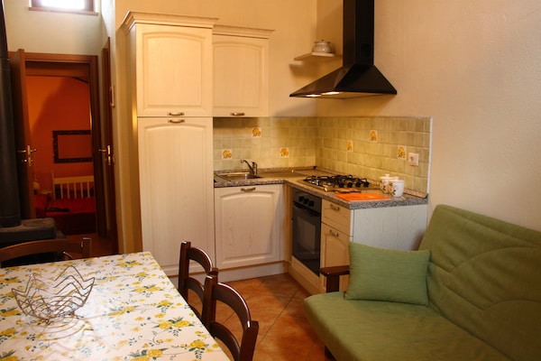 Foto van Vakantiehuis in Toscane met Natuurlijke Vijver - Vakantiehuis in Mulazzo - Kitchen