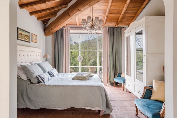 Foto van Boerderij in Toscaanse stijl in Capannori - Vakantiehuis in Capannori - BedRoom