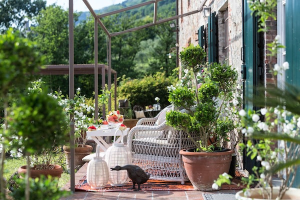 Foto van Boerderij in Toscaanse stijl in Capannori - Vakantiehuis in Capannori - TerraceBalcony