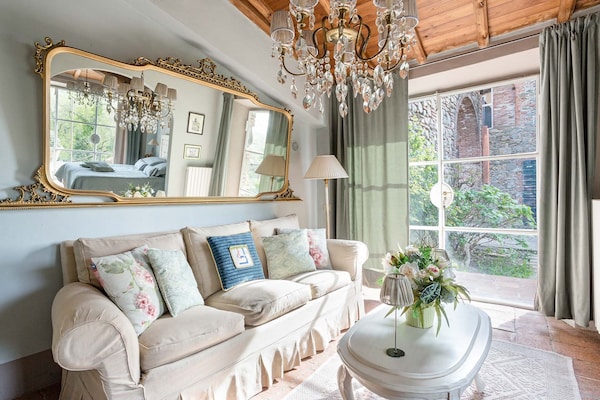 Foto van Boerderij in Toscaanse stijl in Capannori - Vakantiehuis in Capannori - LivingRoom
