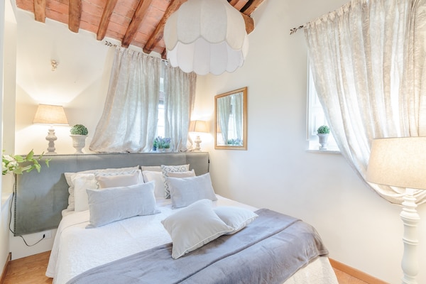 Foto van Boerderij bij Lucca met Toscaanse Uitzicht - Vakantiehuis in Pieve di Compito - BedRoom