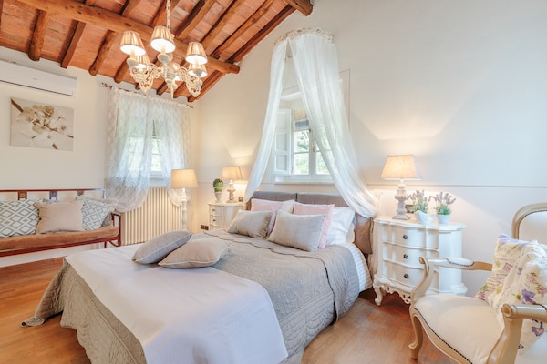 Foto van Boerderij bij Lucca met Toscaanse Uitzicht - Vakantiehuis in Pieve di Compito - BedRoom