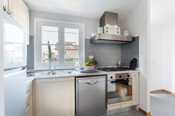 Foto van Penthouse in Italië met panoramaterras - Vakantiehuis in Lucca - Kitchen