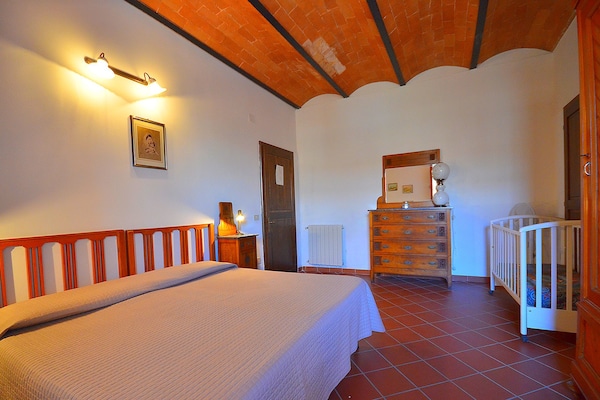 Foto van Agriturismo in Toscane met Zwembad en Wijn - Vakantiehuis in Peccioli - BedRoom