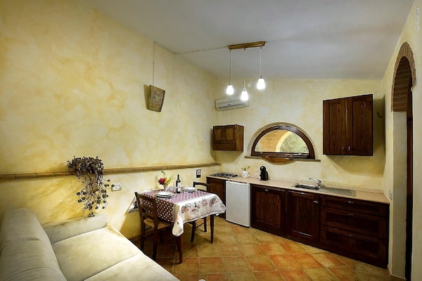 Foto van Boerderij in Castel del Piano met Zwembad - Vakantiehuis in Castel del Piano - Kitchen