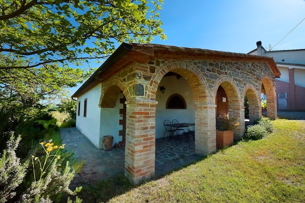 Foto van Boerderij in Castel del Piano met Zwembad - Vakantiehuis in Castel del Piano - ExteriorSummer