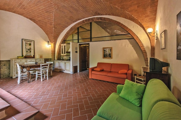 Foto van Landhuis in Toscane met zwembad en olijfgaard - Vakantiehuis in Santo Pietro Belvedere - LivingRoom