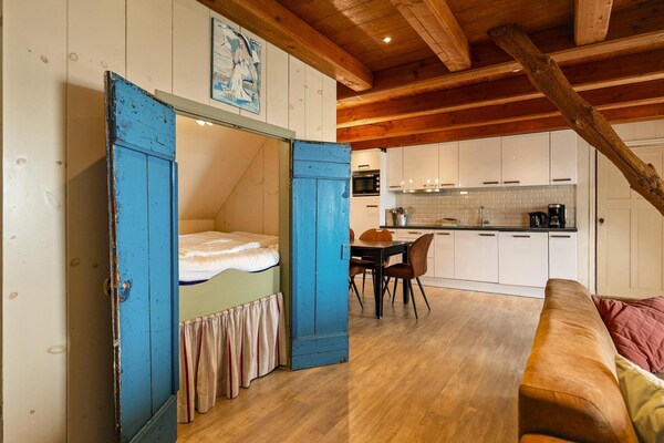 Foto van Appartement Boerderij bij het strand - Vakantiehuis in Schagen - LivingRoom