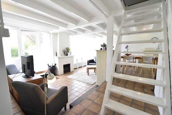 Foto van Vakantiehuis Warmenhuizen bij Duinen - Vakantiehuis in Warmenhuizen - LivingRoom