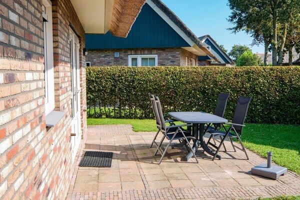 Foto van Villa dichtbij bos, strand & zee - Vakantiehuis in Sint Maartenszee - TerraceBalcony