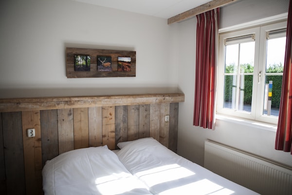 Foto van Charmante tuinvakantie - Vakantiehuis in Voorthuizen - BedRoom