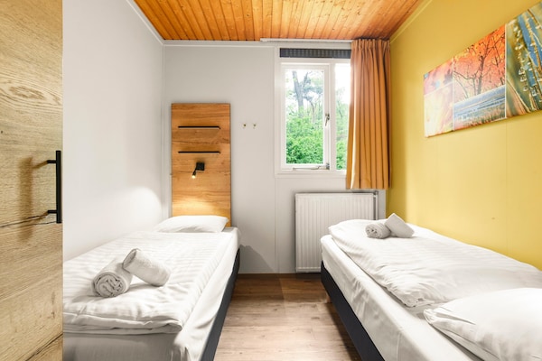 Foto van Bosretraite met open haard - Vakantiehuis in Putten - BedRoom