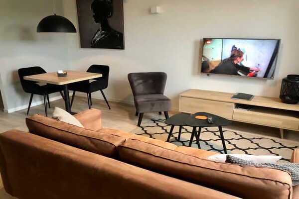 Foto van Lodge met prachtig uitzicht op de kerk - Vakantiehuis in Zoutelande - LivingRoom