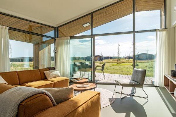 Foto van Moderne ecowoning vlakbij het strand - Vakantiehuis in Wissenkerke - LivingRoom